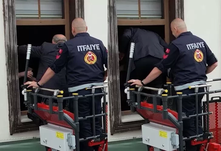 Qəribə hadisə: Bələdiyyə sədri binaya ikinci mərtəbədən kran vasitəsi ilə daxil oldu- FOTO